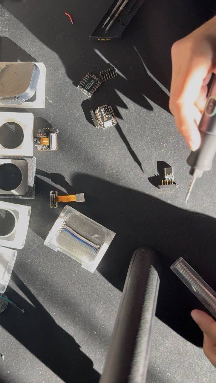 Electronics workbench &mdash; soldering PCBs, microcontrollers, and custom hardware components