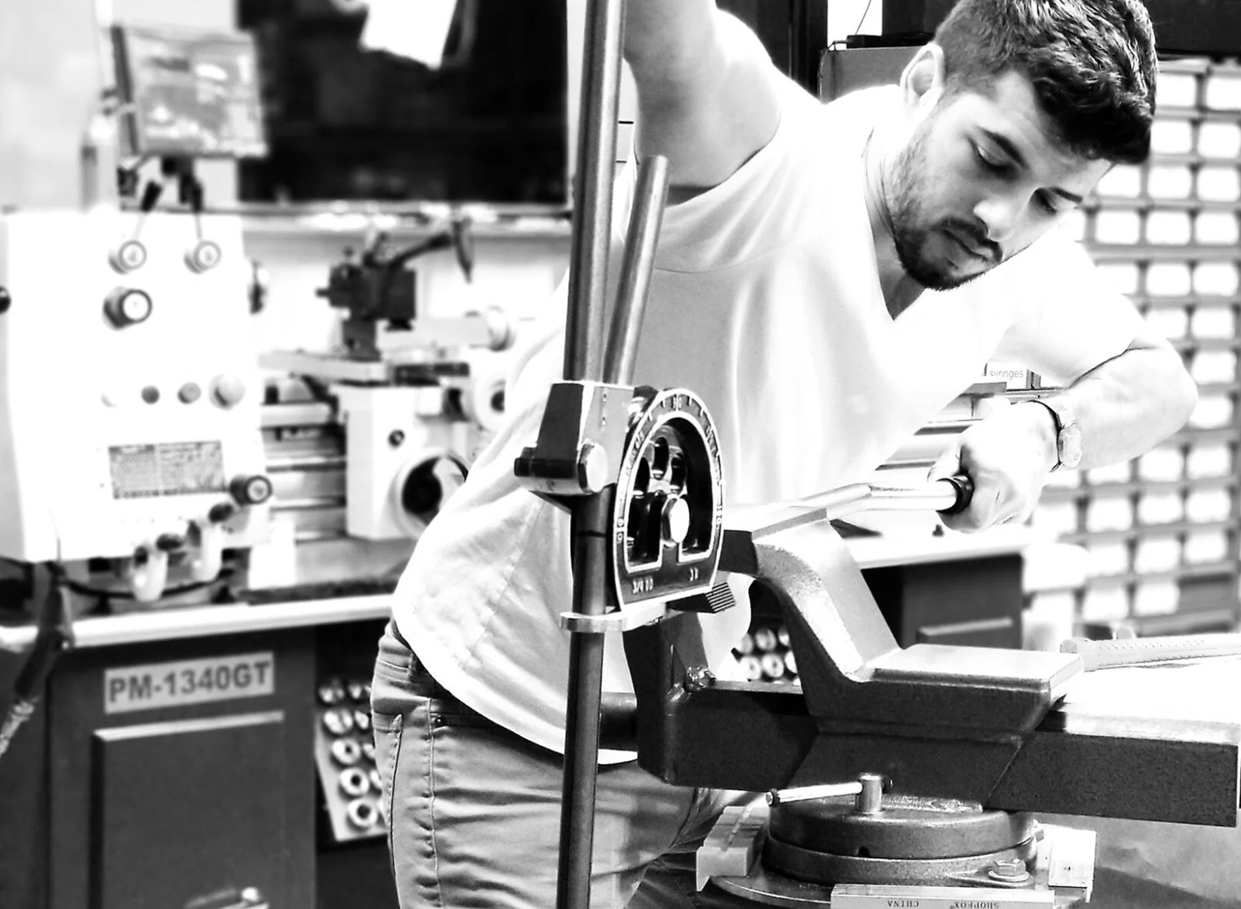 Hands-on metalwork at the Liberti Lab &mdash; using a vise and machinist tools at the lathe bench
